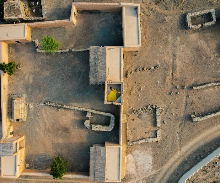 a bird's eye view of some buildings made out of concrete blocks