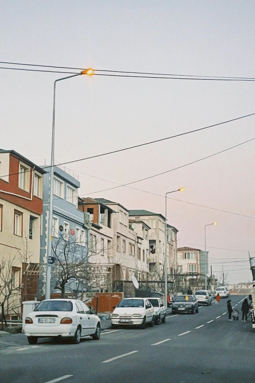 a street is full of cars on the road