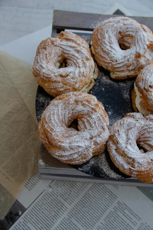 a bunch of doughnuts sitting on top of a counter