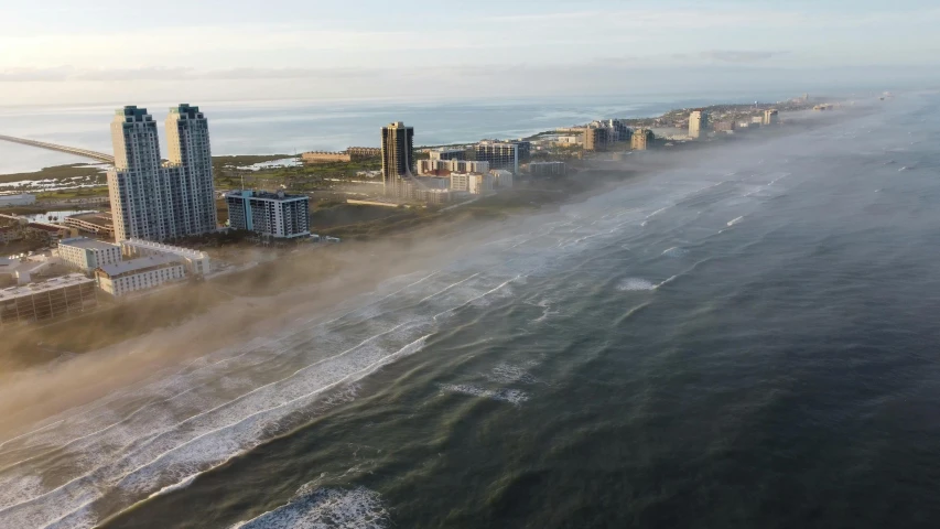 a seawall with mist rising out of it