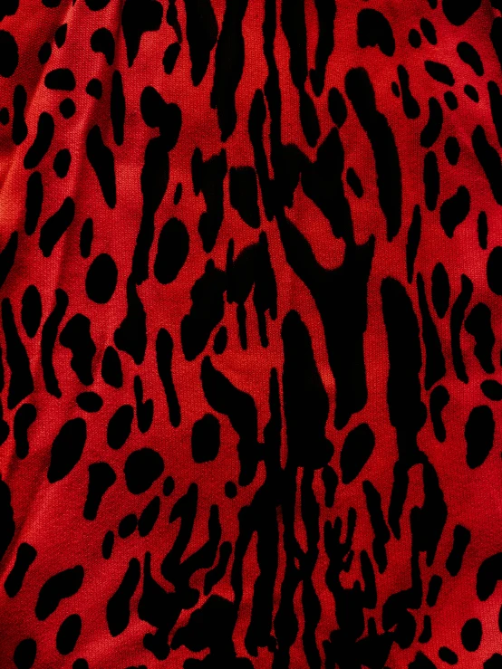 an animal pattern on a red background