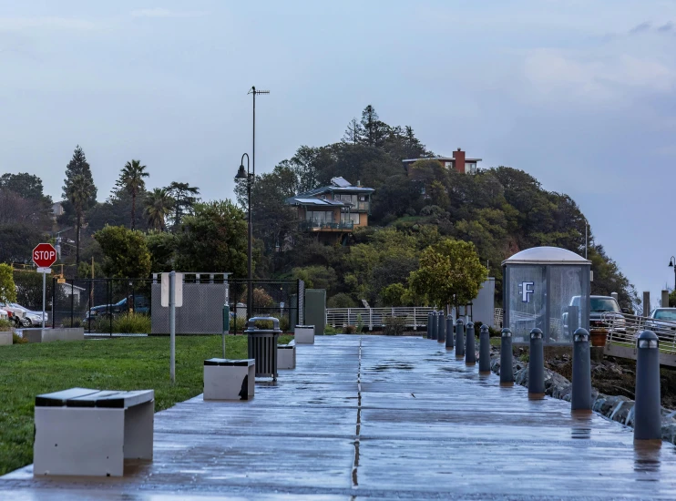 a path between the houses leading to the parking lot