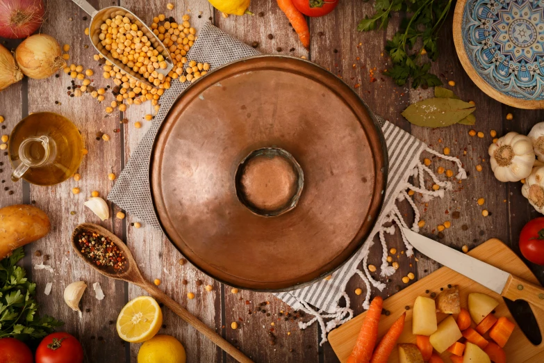 a bowl and some ingredients sitting on a table