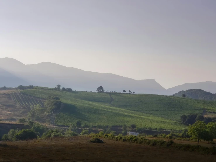 mountains with houses on them in the distance