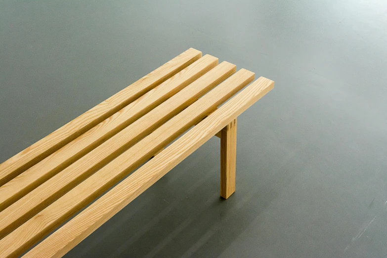 a bench made of wood and painted with natural stain