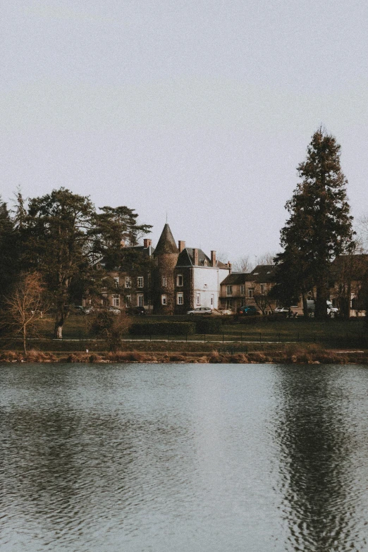 a large house in the middle of a lake
