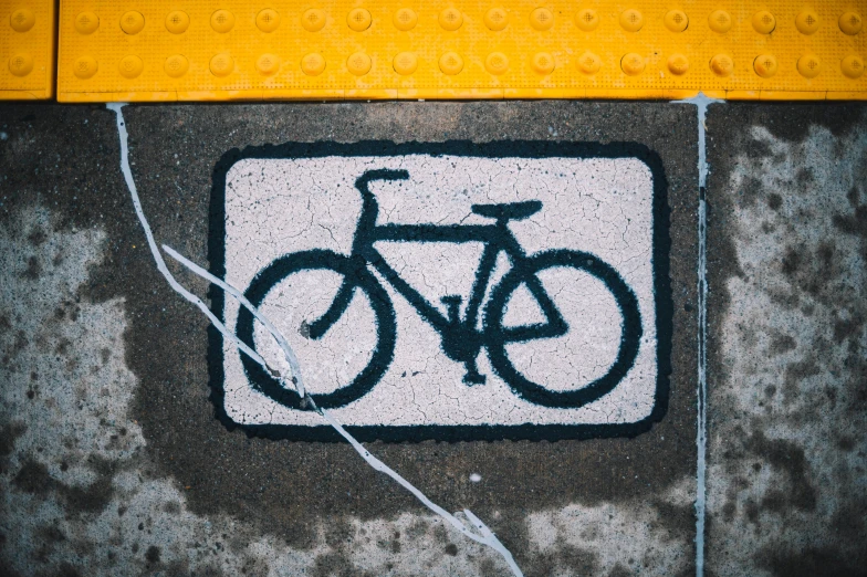 a white sign with black and white drawing on it