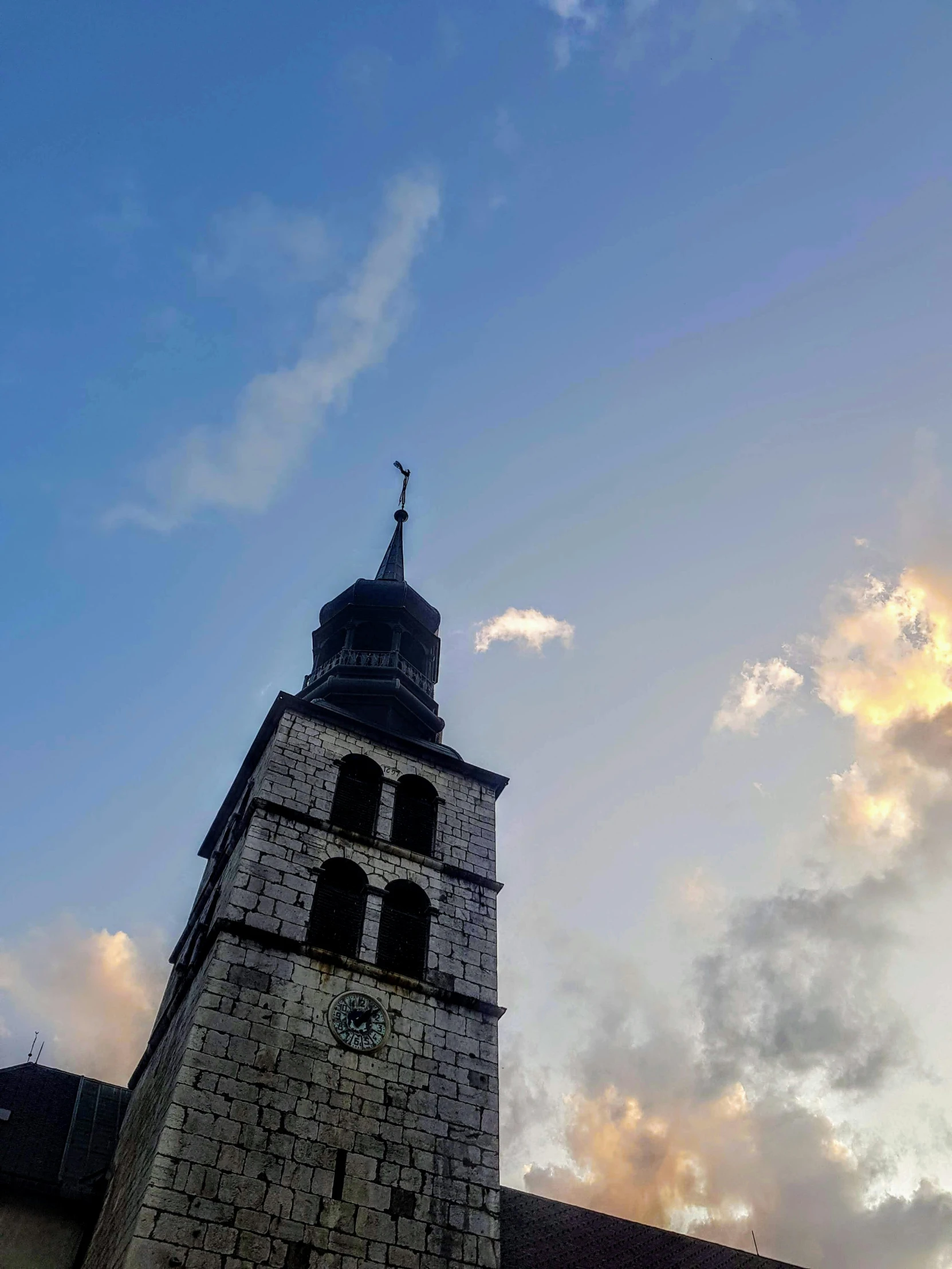 a very tall building that has a steeple and a clock on it