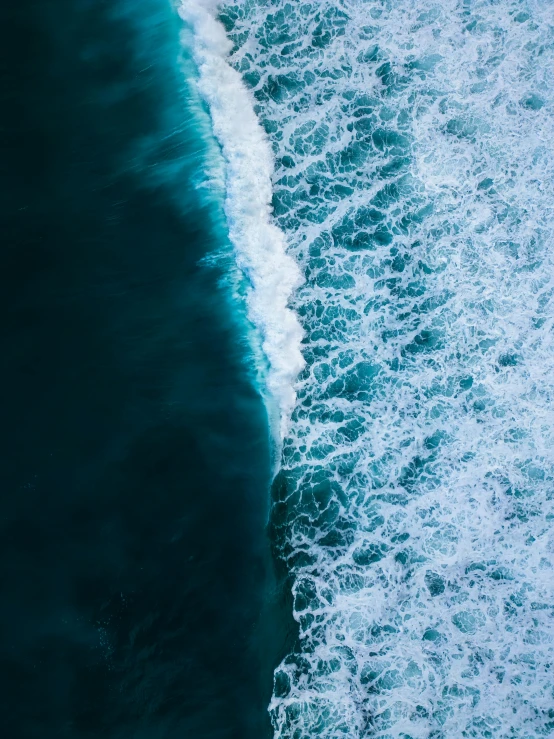 the ocean is blue and white in color