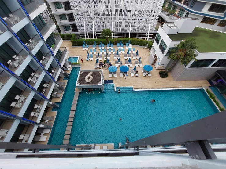 an aerial view of a el pool, overlooking the el