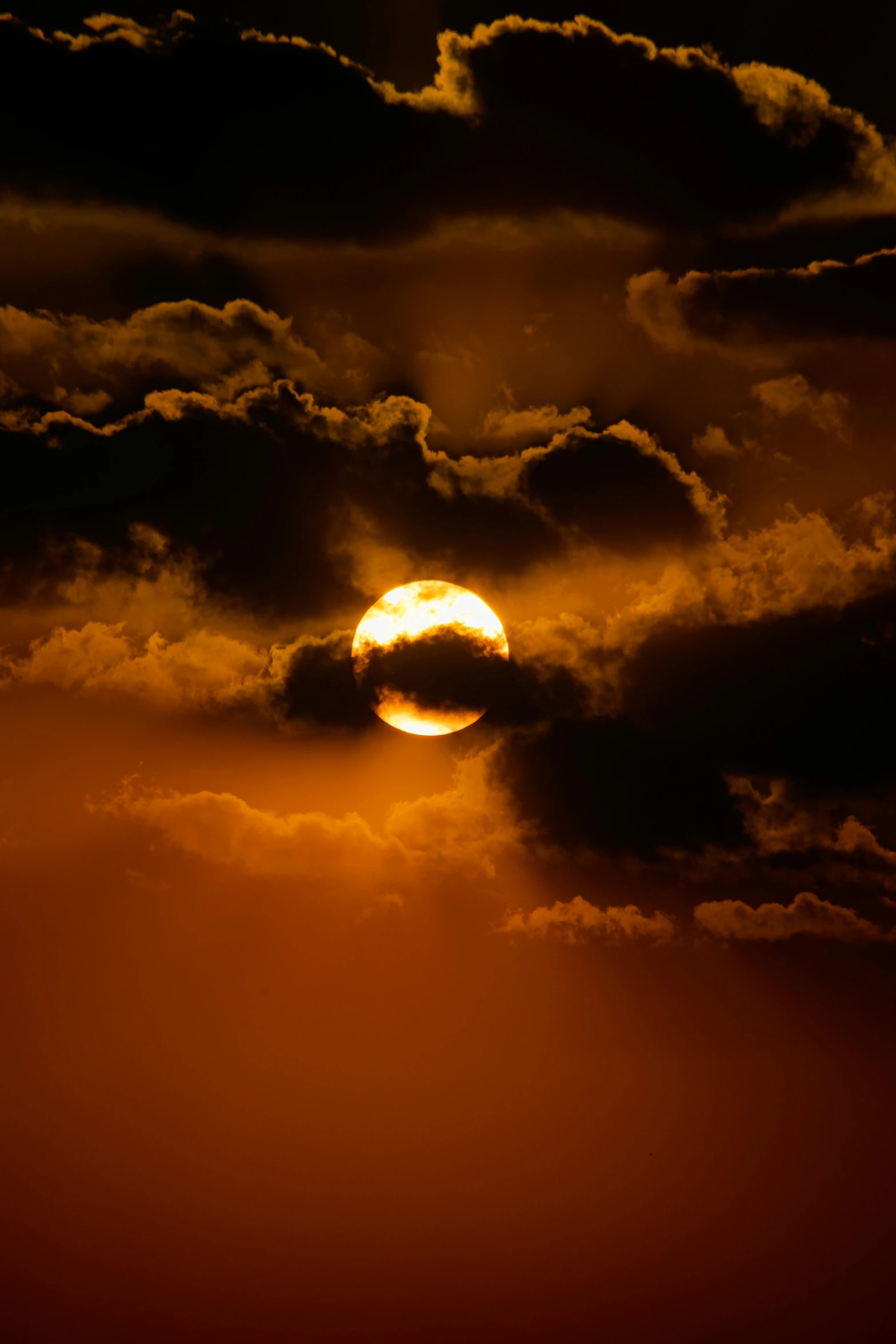 the sun is shown through the clouds as it looks like it has been put down