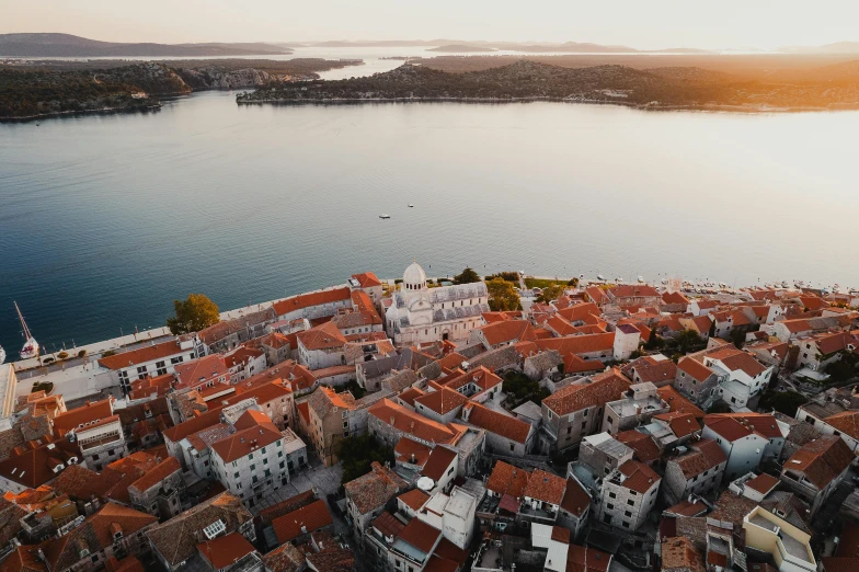 a town and lake, seen from the height of a tower