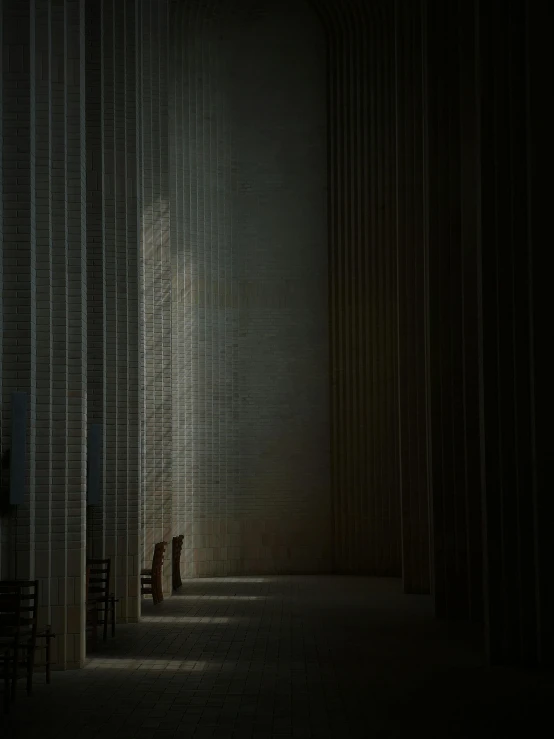 light shining through the windows in a room with chairs