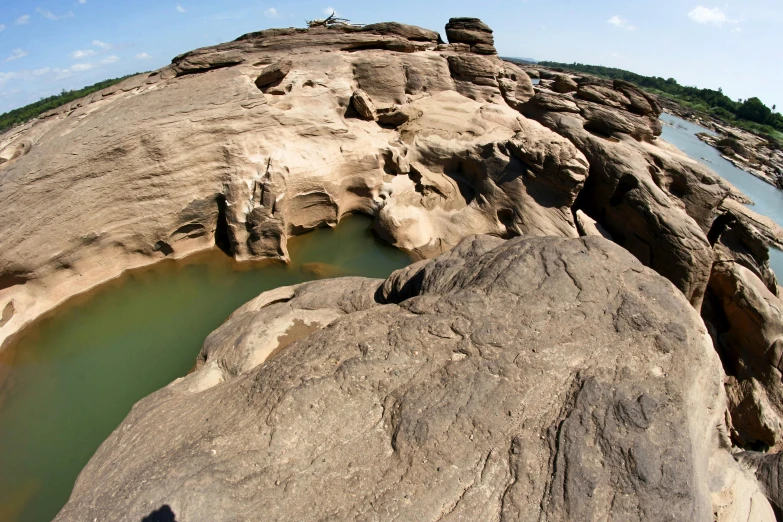 there is an island of rocks in the water