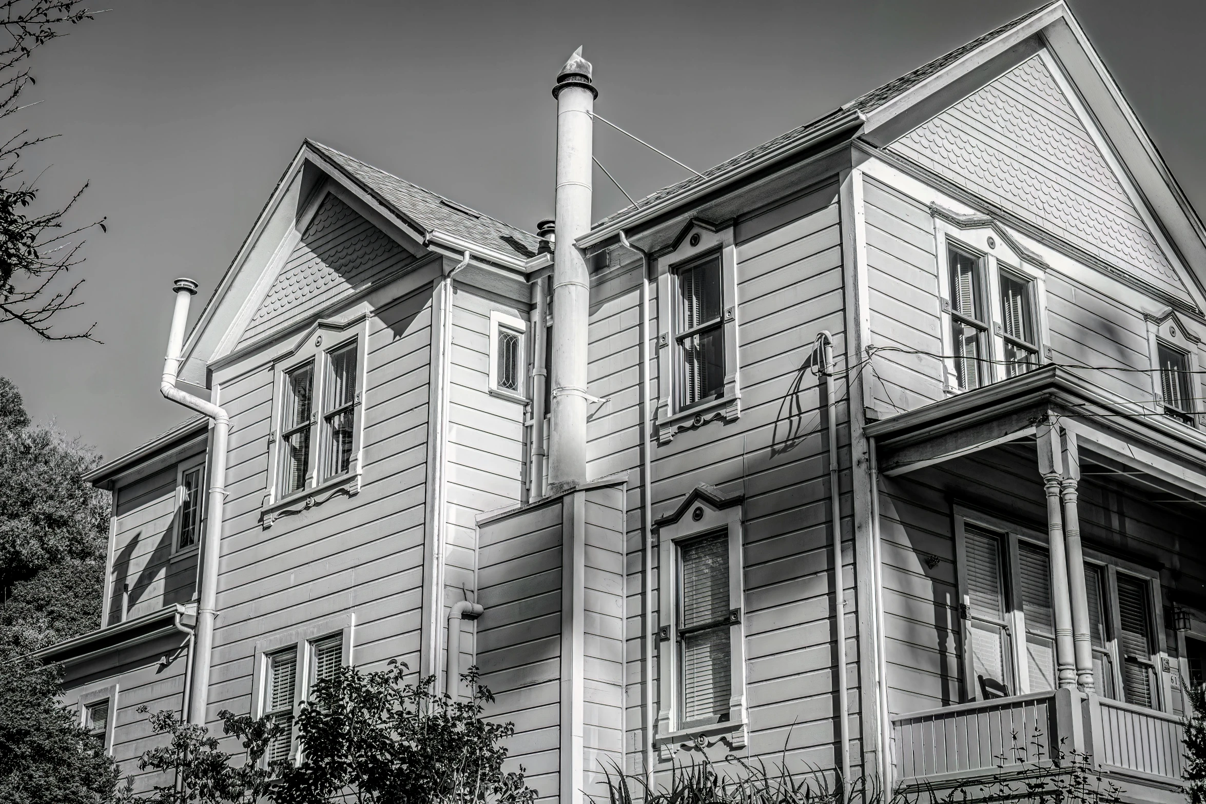 a black and white po of a building with windows