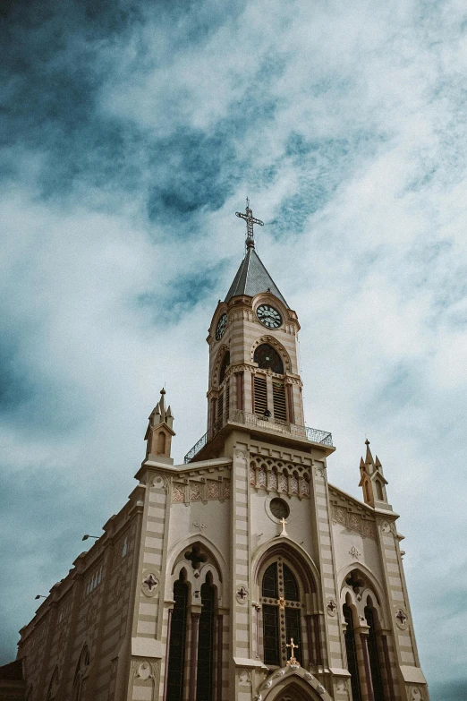 a cathedral in the distance with a clock on top