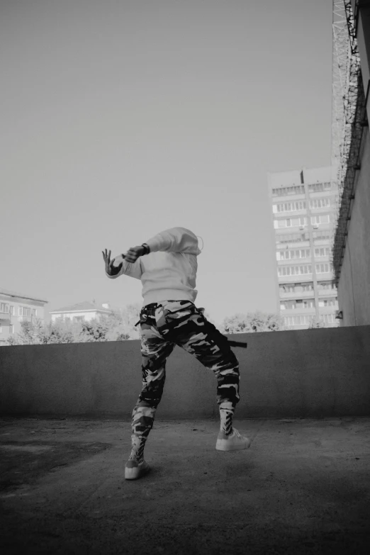 a man doing a trick in the air with a skateboard