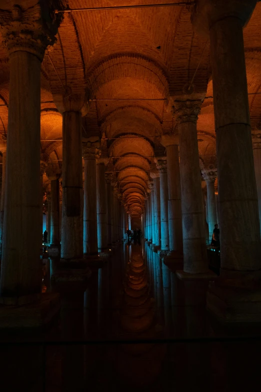 an empty room in an old museum with arches