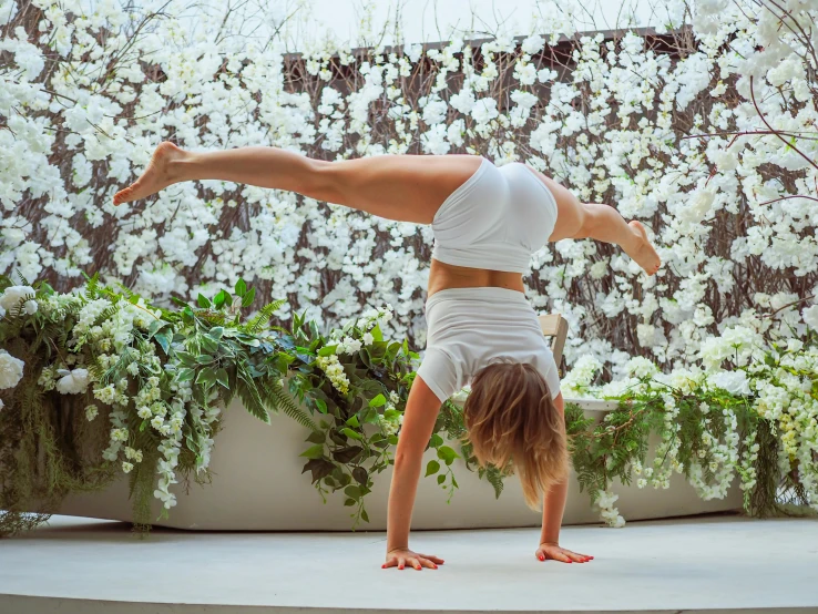 a  doing yoga on an inflatable mat