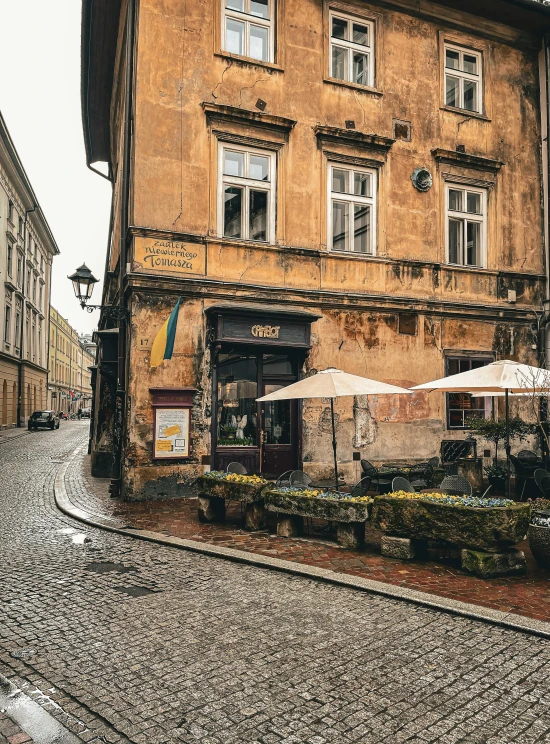 an old building with an umbrella on top