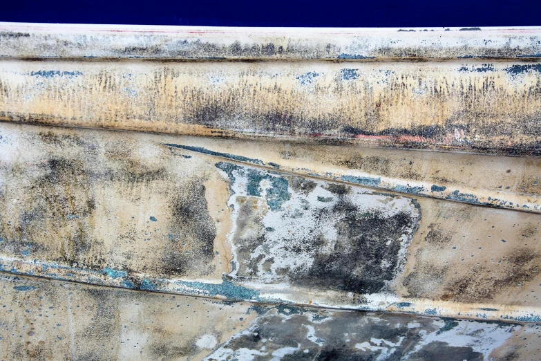 a close up of an old boat's hull and part