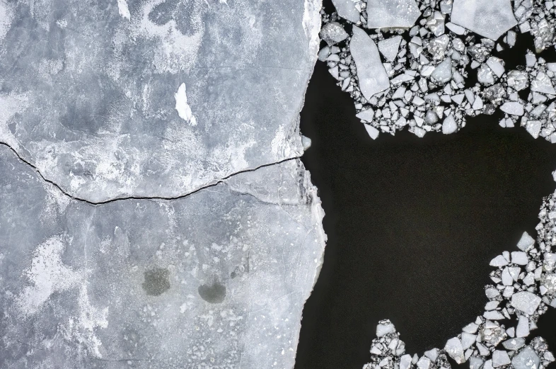 an aerial view of a grey rock area