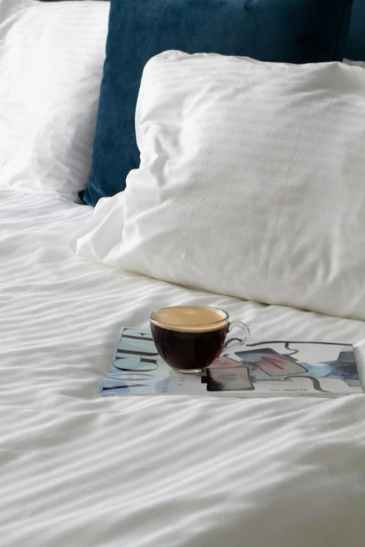 coffee cup on top of some kind of placemat