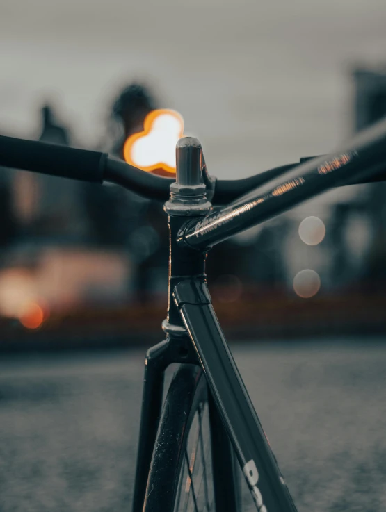 an image of bicycle locked at the side of street