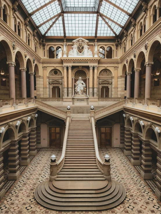 a large room with a large ceiling and many stairs