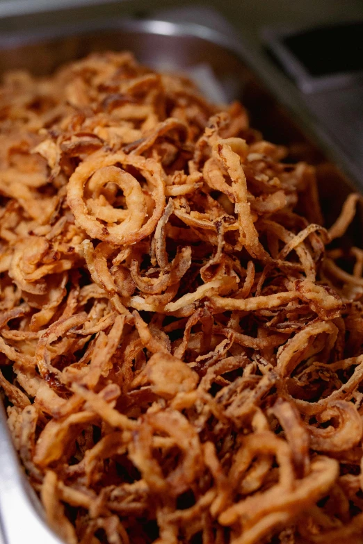 an odd looking bowl of cooked onions