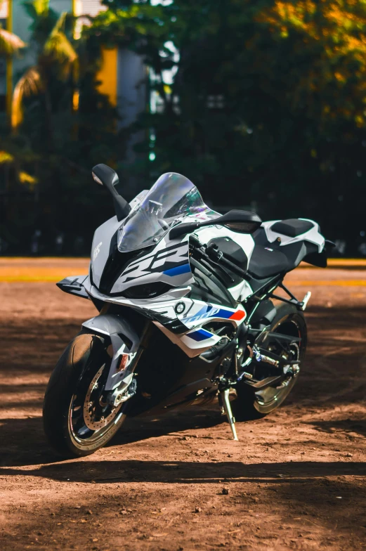 a very nice motorcycle that is sitting in the dirt