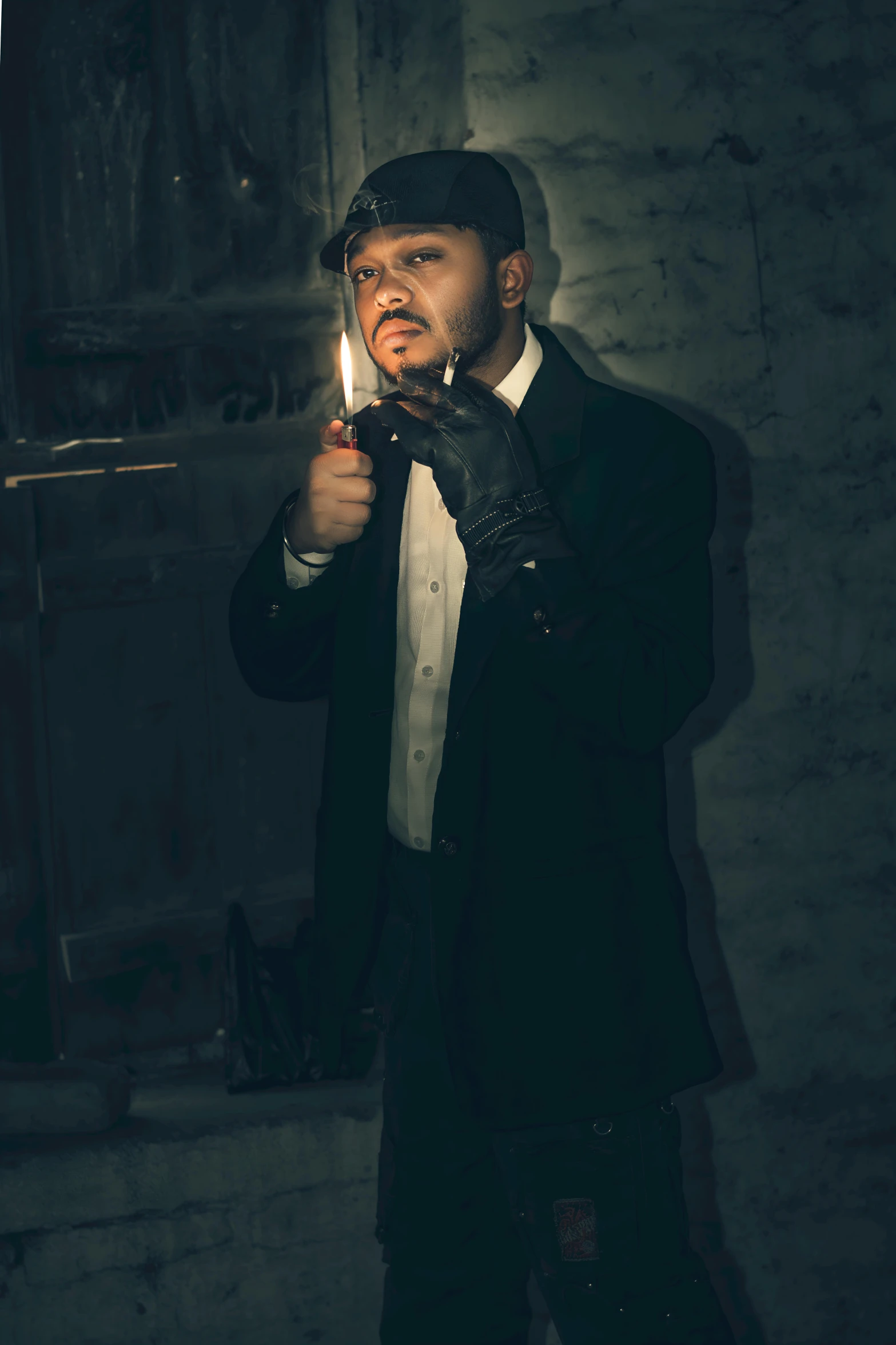 a man smoking a cigarette with a black top hat
