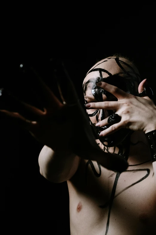 an extreme close up s of hands and face