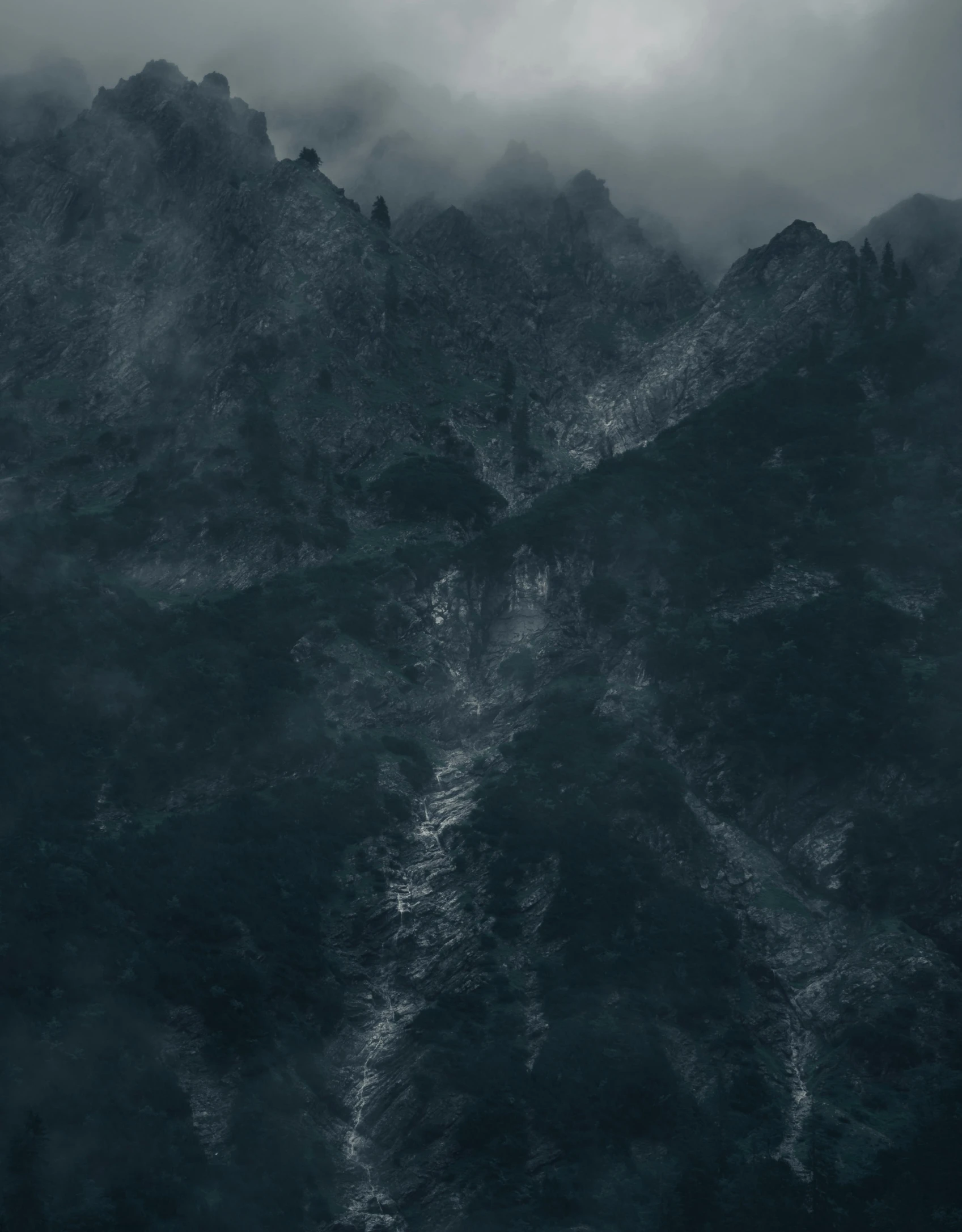 black and white pograph of mountains on a cloudy day