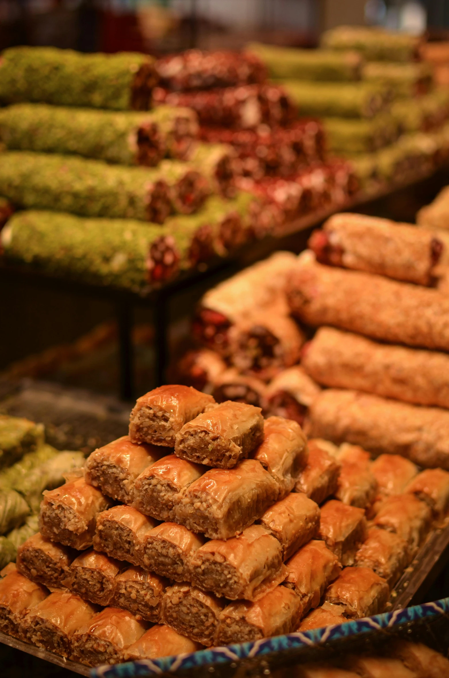 a selection of desserts on display in a buffet