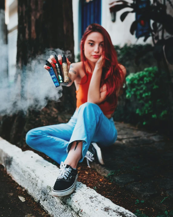 a  smoking soing with colored markers in her hand