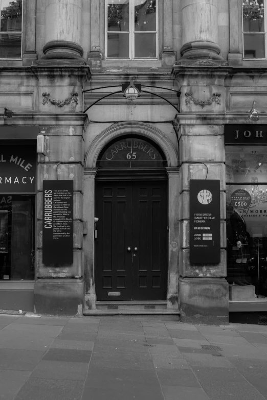 an old building has clocks on it