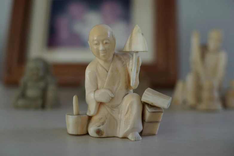 some small figurines sitting on top of a table