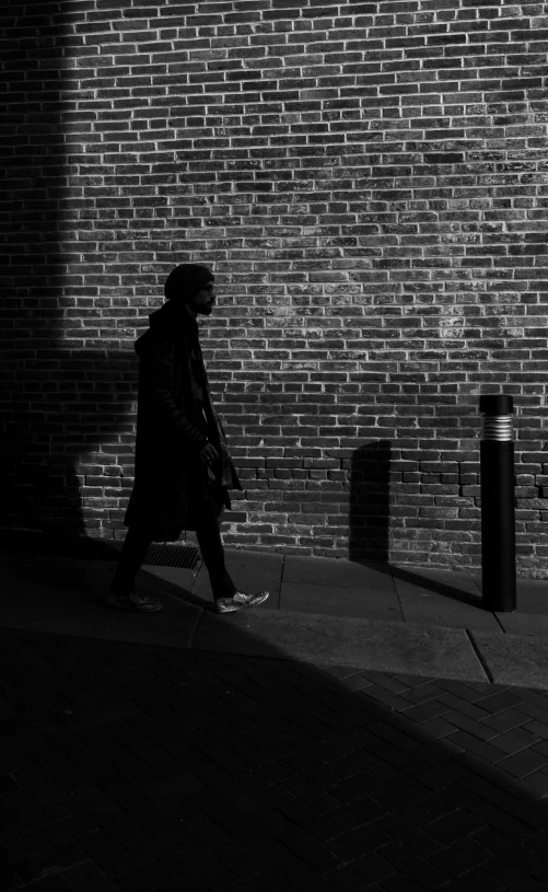 a person walking down a street with a backpack