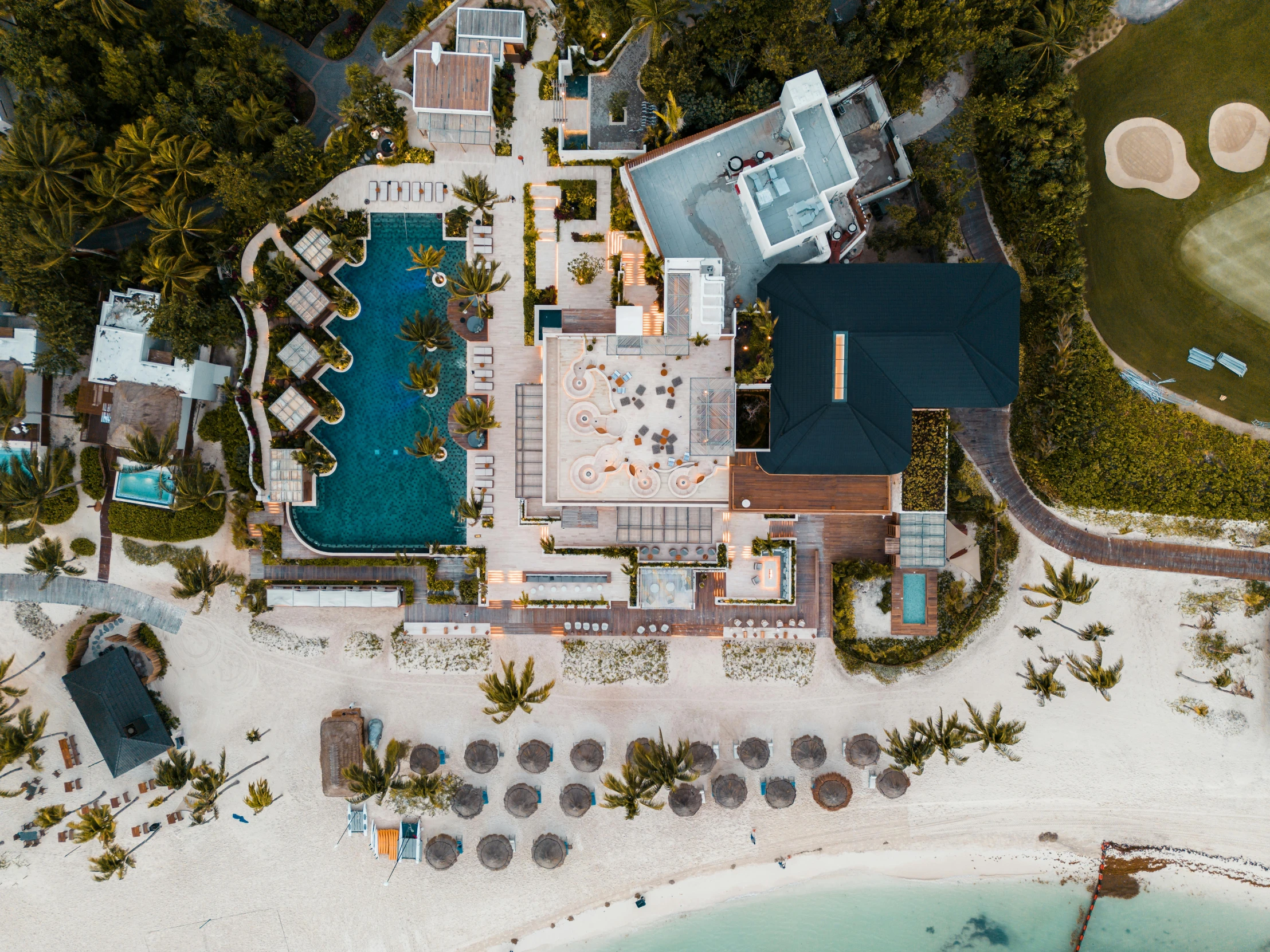 a beachfront resort with an aerial view