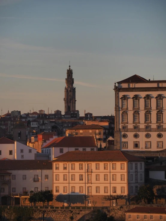 the building with the clock tower is at dusk