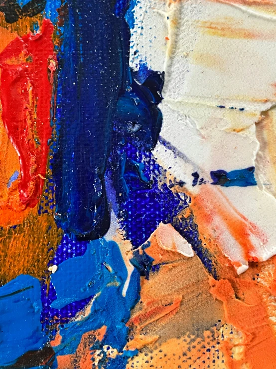abstract paint with a blue, yellow, and orange design