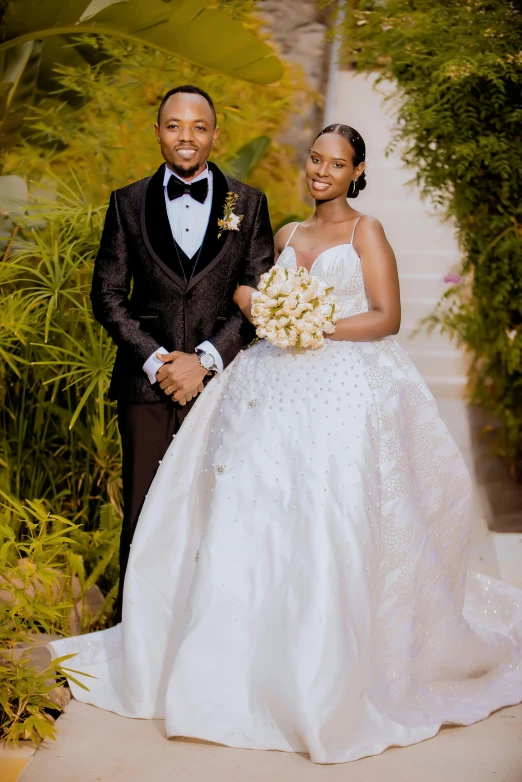 the newly married couple pose for a portrait