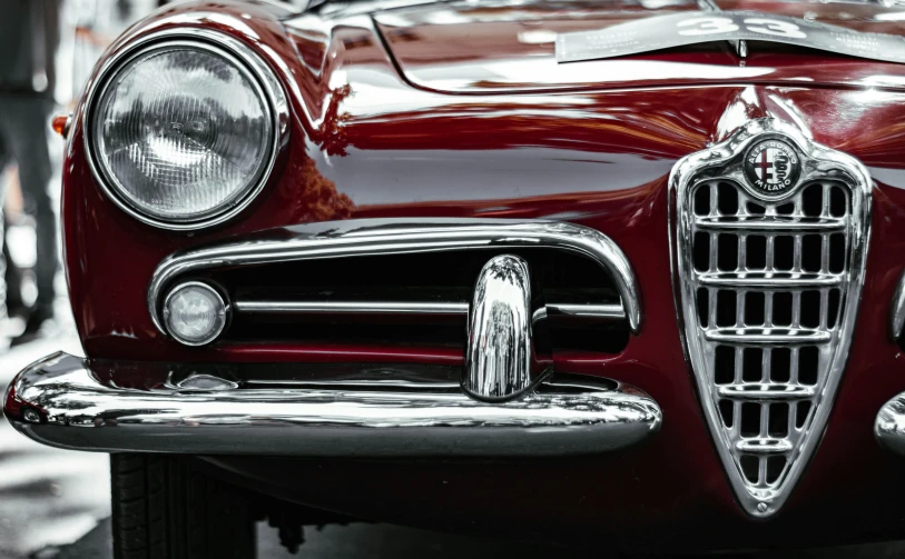 a closeup view of the hood or grilles on an old car
