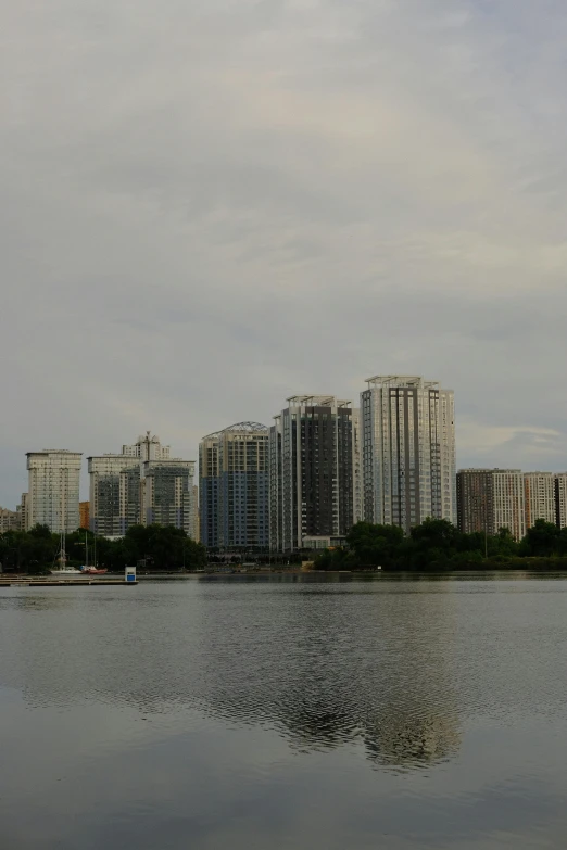 buildings are shown over the water from a body of water