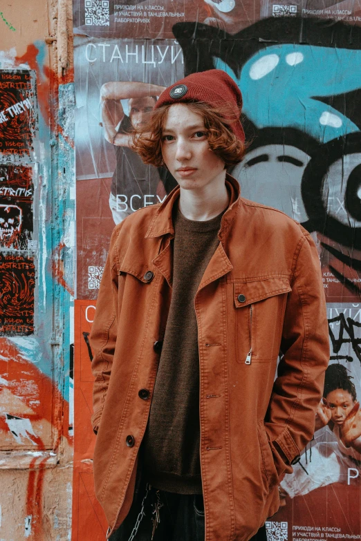 a person is posing for the camera while wearing a hat