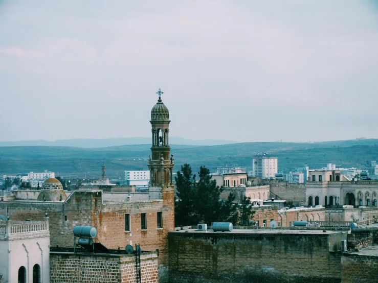 a large tower with a clock sitting behind it