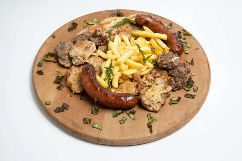 a plate with steaks, sausages and pineapple fries