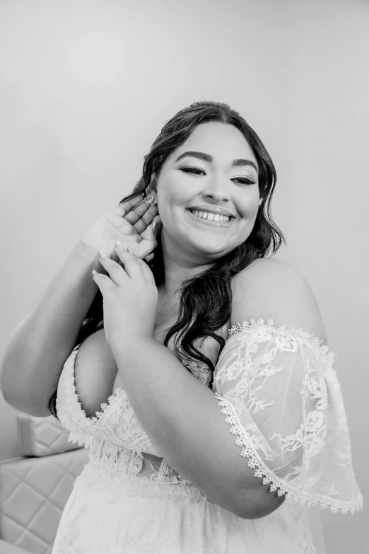 a bride gets ready in a black and white po