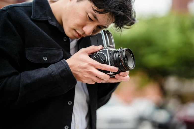 a man taking a picture with his camera